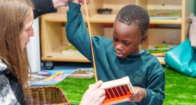 A young boy in an education setting 